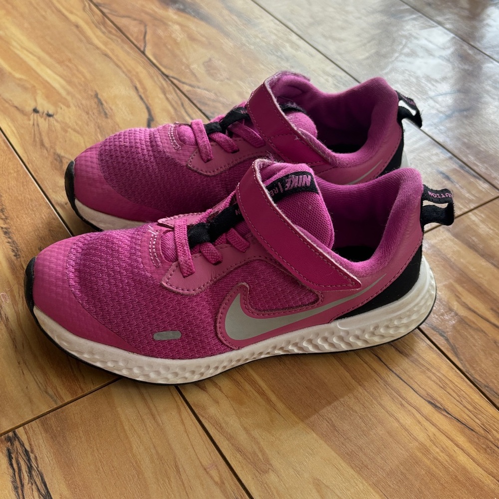 NIKE REVOLUTION Kids Pink and Black Athletic Sneakers with Reflective Swoosh
